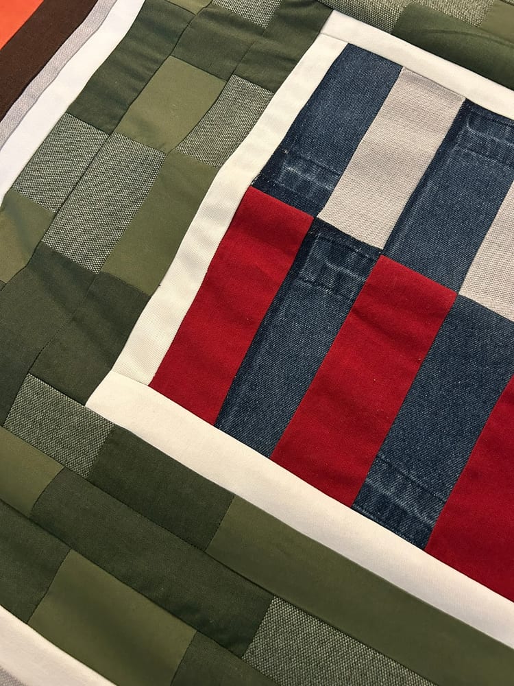 Detail: the denim and red centre panel